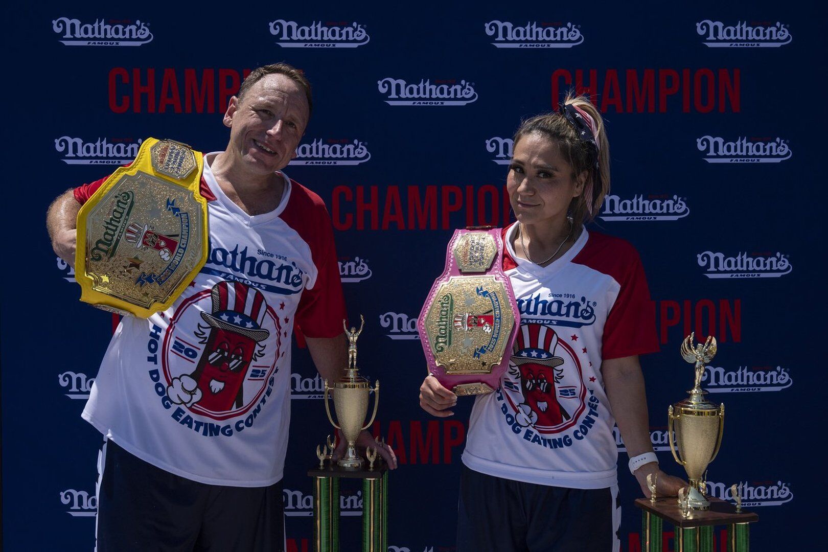 Photos show revelers and competitors alike savoring a July Fourth hot dog eating contest